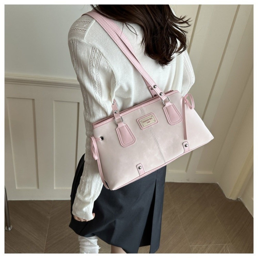 Minimalistyczna torba typu tot – Top Handle Structured recenzja i cena