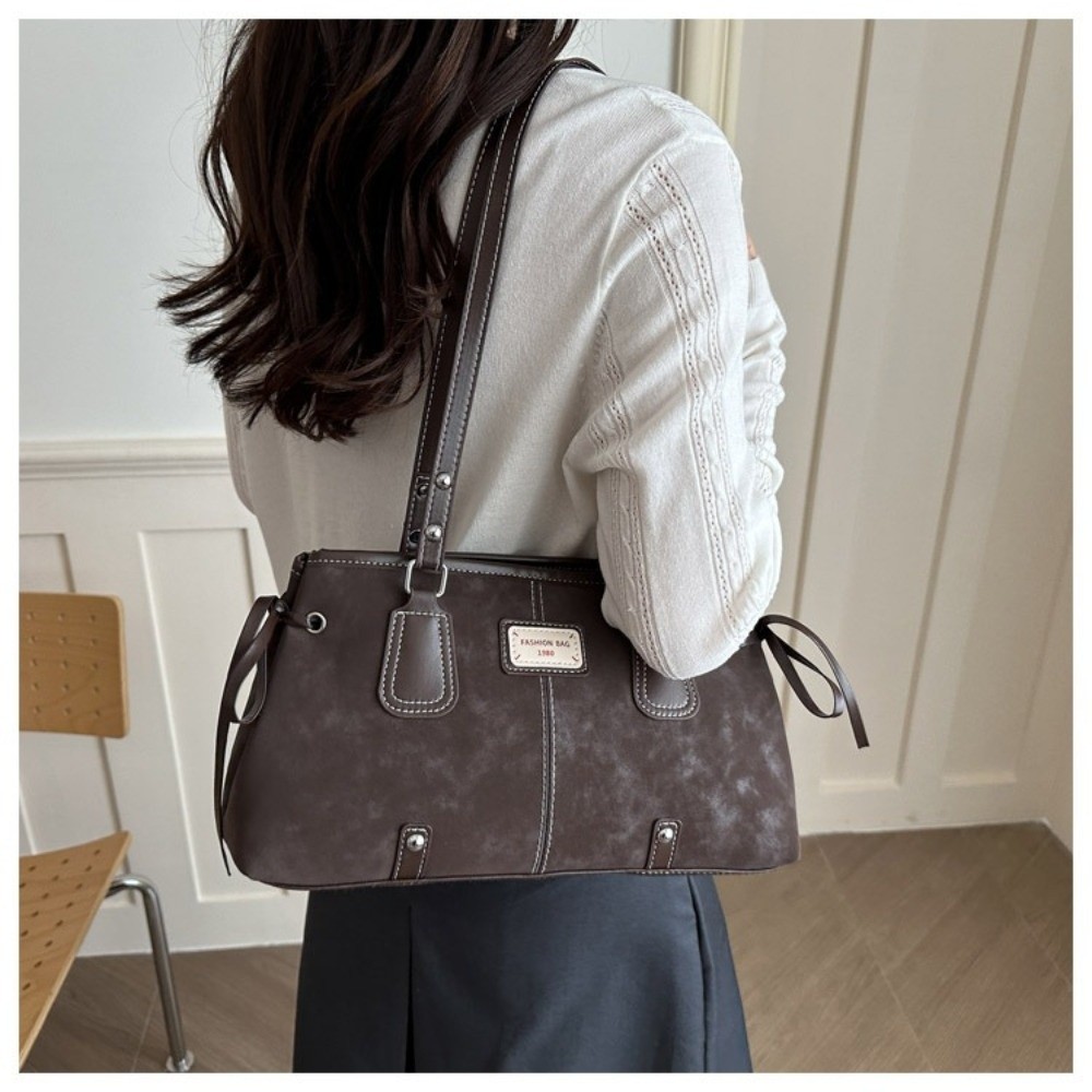 Minimalistyczna torba typu tot – Top Handle Structured recenzja i cena