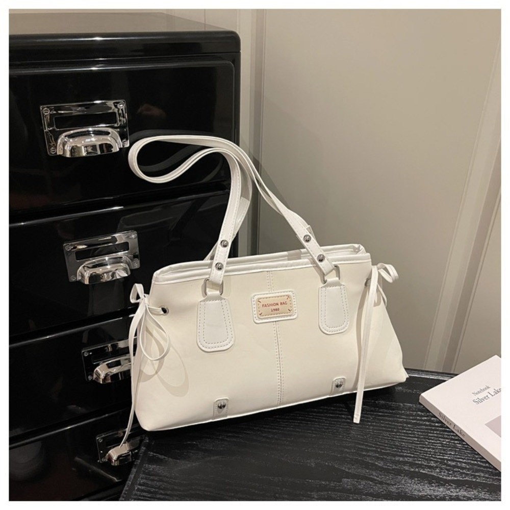Minimalistyczna torba typu tot – Top Handle Structured recenzja i cena